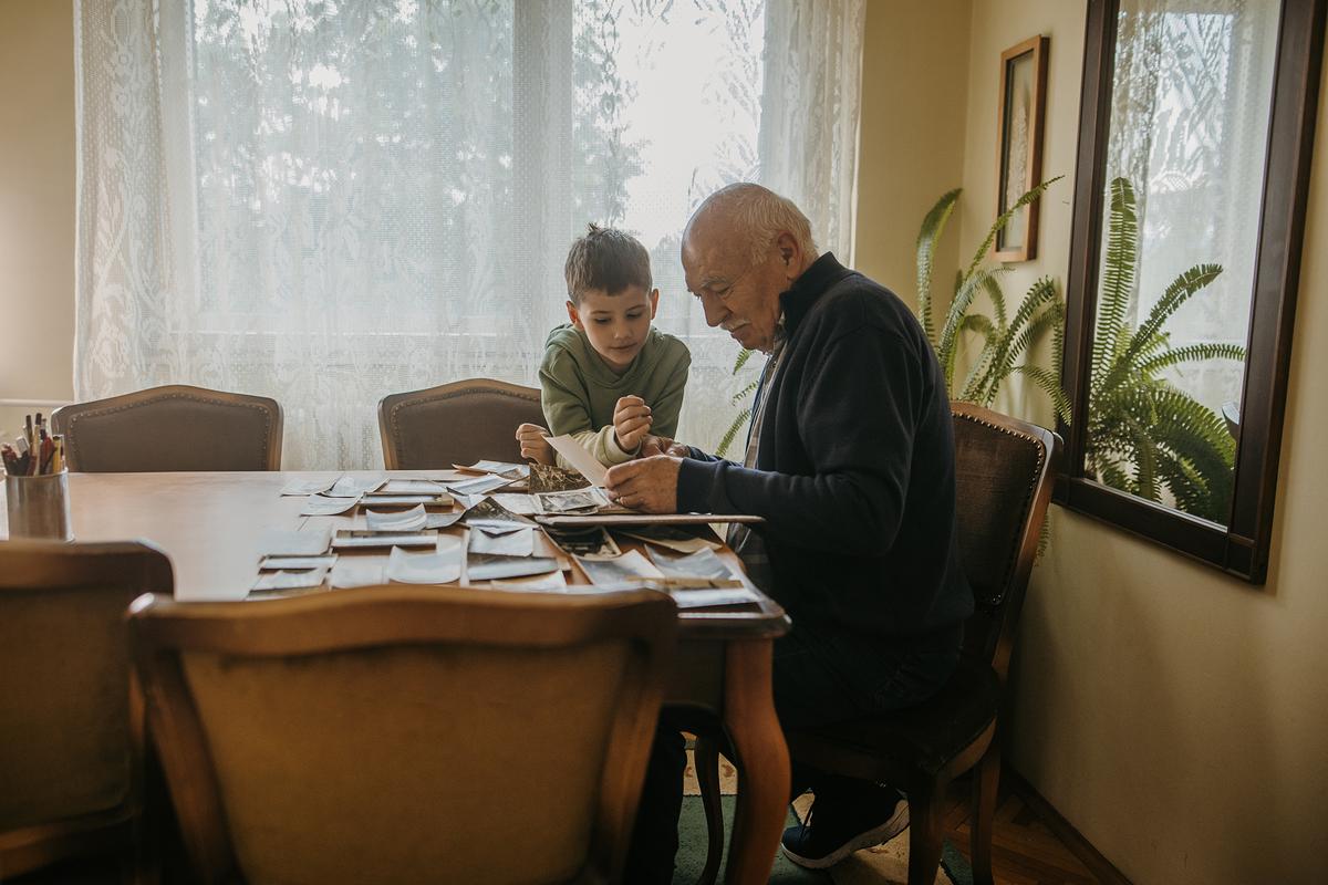 Stories shared across generations help preserve family history that might otherwise fade with time. (freemixer/Getty Images)