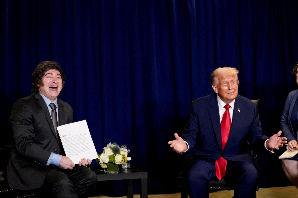 U.S. President Donald Trump (R) and Argentina's President Javier Milei react as they meet during the 80th United Nations General Assembly, in New York City on Sept. 23, 2025. (Al Drago/Reuters)
