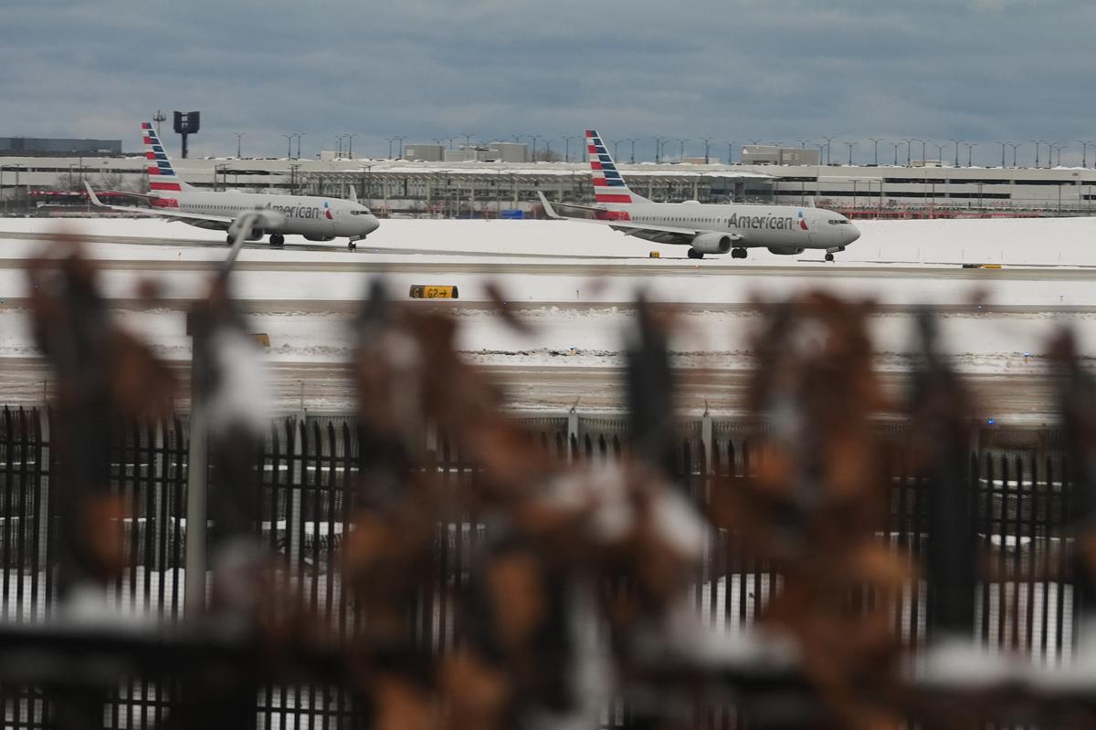 Post-Thanksgiving Travelers in Chicago See Hundreds of Flights Canceled and Delayed After Snowstorm