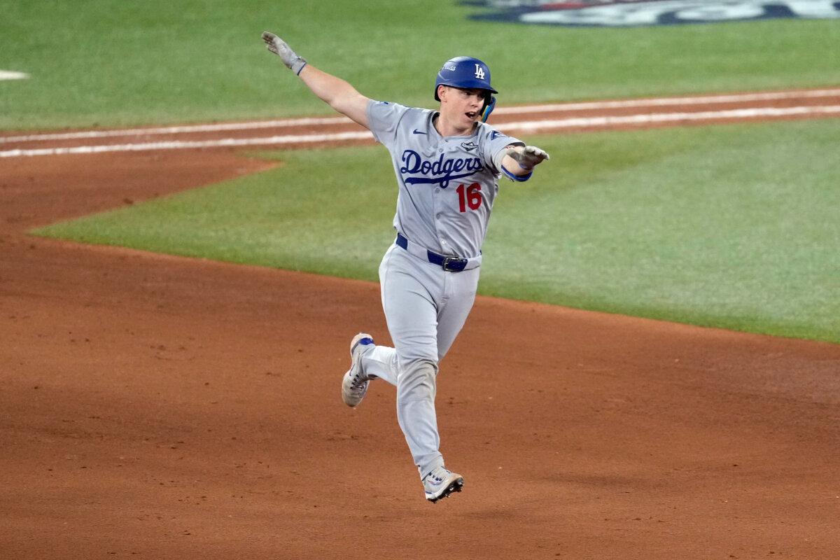 Los Angeles Dodgers' Will Smith celebrates his home run against the Toronto Blue Jays during the 11th inning in Game 7 of baseball's World Series in Toronto on Nov. 2, 2025. (Ashley Landis/AP Photo)