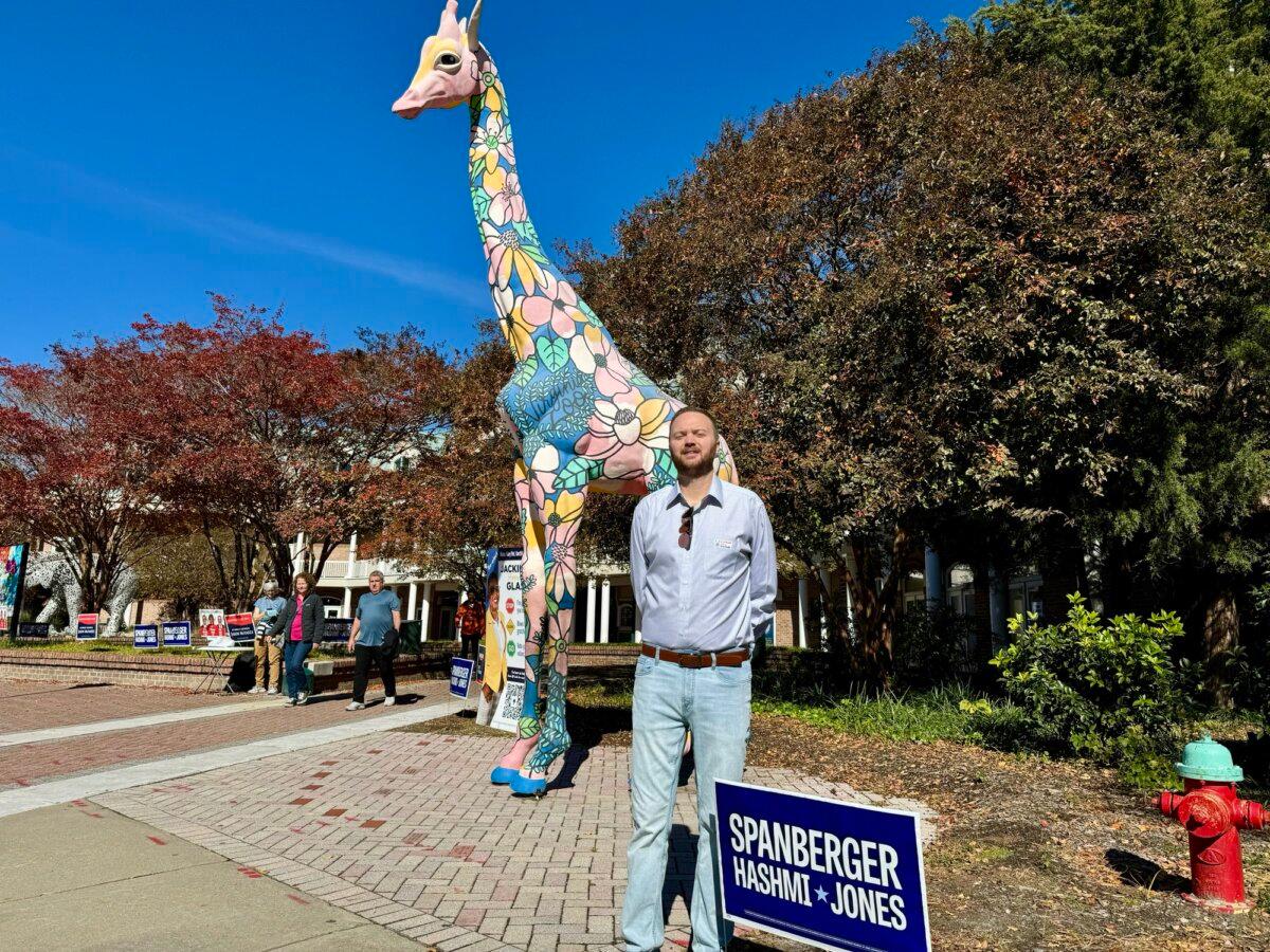 Charles Edward Rigney, a restaurant manager, stands outside the Virginia Zoo, after casting his ballot in the state’s general election in Norfolk, Va., on Nov. 4, 2025. (Arjun Singh/The Epoch Times)