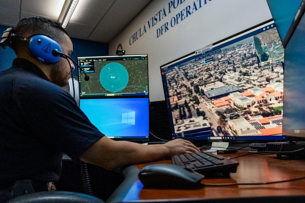 A police officer monitors a drone flight near the Chula Vista Police Department in Chula Vista, Calif., on Aug. 21, 2025. (John Fredricks/The Epoch Times)