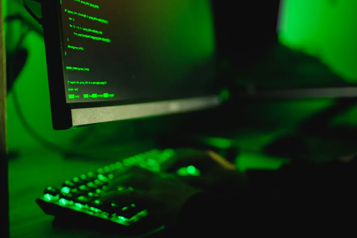 In this photo illustration, hacker types on a computer keyboard on May 13, 2025. (Oleksii Pydsosonnii/The Epoch Times)