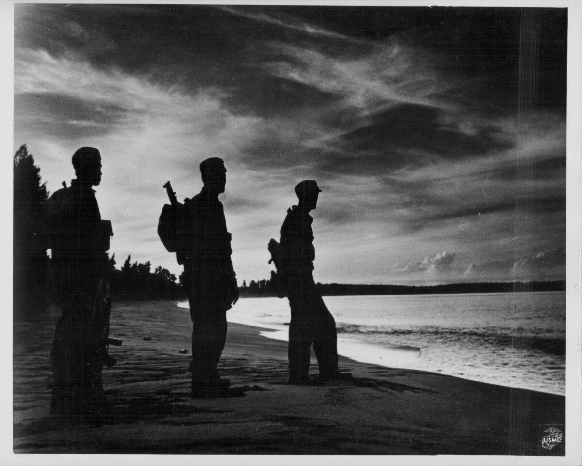 Allied soldiers assigned to the Pacific Campaign of WWII, in Papua New Guinea, 1944. (Photo by US Marine Corps/Getty Images)