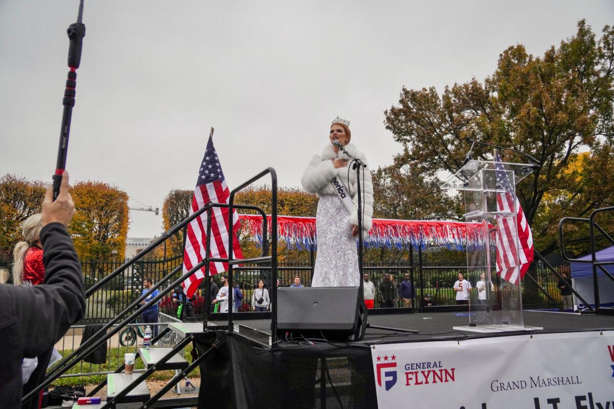 Cassie Donegan, Miss America 2026, sings “God Bless America” at the National Veterans Parade in Washington on Nov. 9, 2025. (Emel Akan/The Epoch Times)