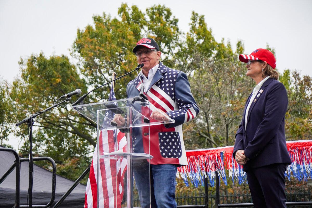 Gen. Michael Flynn and his sister, Mary Flynn O'Neill, at the National Veterans Parade event in Washington on Nov. 9, 2025. (Emel Akan/The Epoch Times)