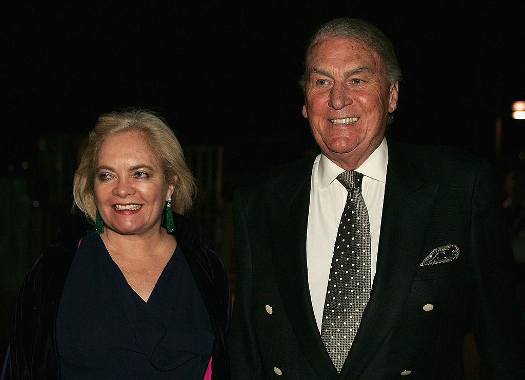 John Laws and his wife Caroline, whom he lost to cancer in 2020, attend the 5th anniversary of Otto Ristorante Italiano, The Finger Wharf Woolloomooloo, March 23, 2005 in Sydney, Australia. (Patrick Riviere/Getty Images)