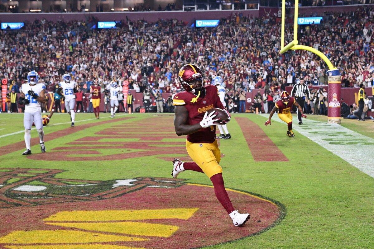 Deebo Samuel of the Washington Commanders catches a touchdown in the third quarter of a game against the Detroit Lions at Northwest Stadium in Landover, Md., on Nov. 9, 2025. (Greg Fiume/Getty Images)