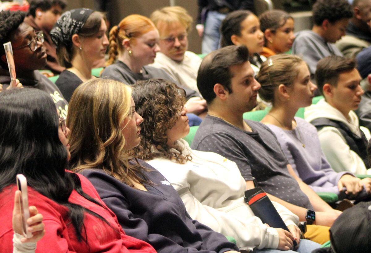 University of North Texas students listen to speakers during an event sponsored by Turning Point USA in Denton on Nov. 10, 2025. (Michael Clements/The Epoch Times)