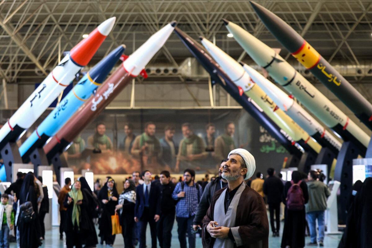 Iranians visit an exhibition of missile and drone achievements in Tehran on Nov. 12, 2025. (Atta Kenare/AFP via Getty Images)