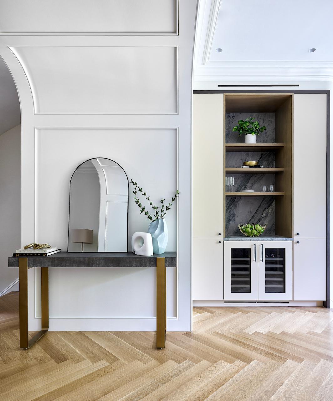 Greenery such as a house plant and affordable stems add a sense of approachable luxury in this residence. (Handout/TNS)