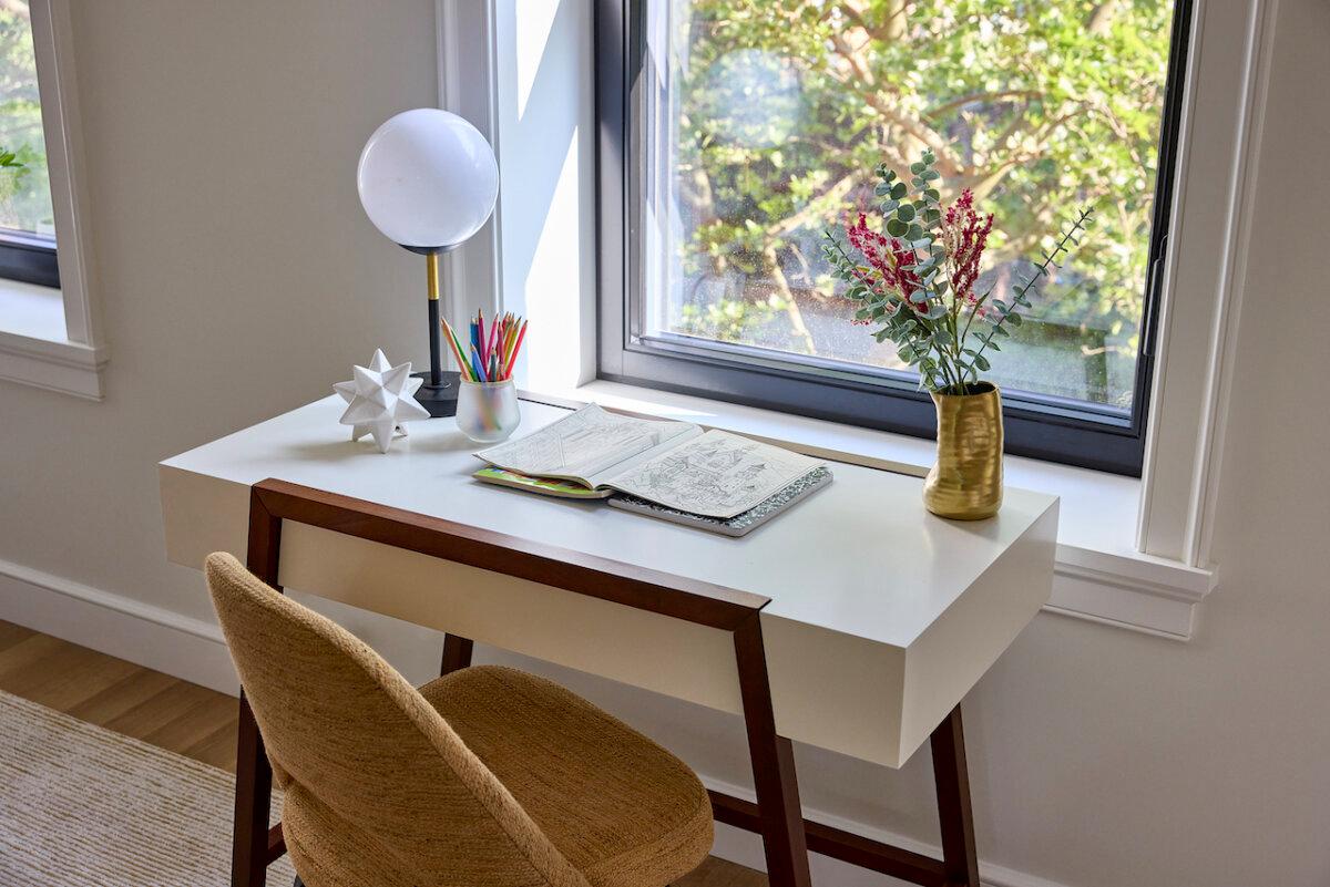 Colored pencils, notebooks and coloring books purchased from a dollar store serve as affordable accents for a desk in a children's room. (Handout/TNS)