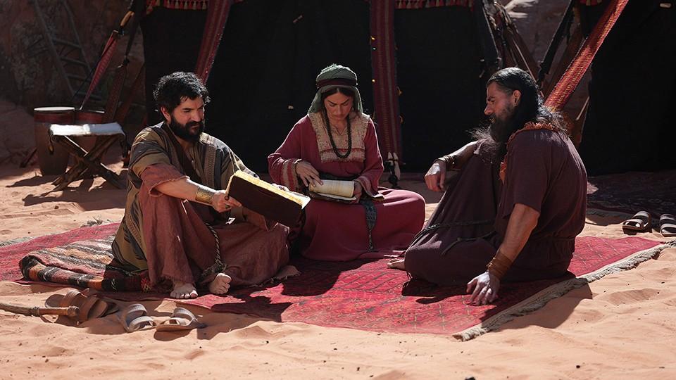 (L–R) Aaron (Majed Sayess), Miriam (Shereen Khan), and Moses (Wasim No'Mani), in "The Promised Land." (Milk & Honey Studios)
