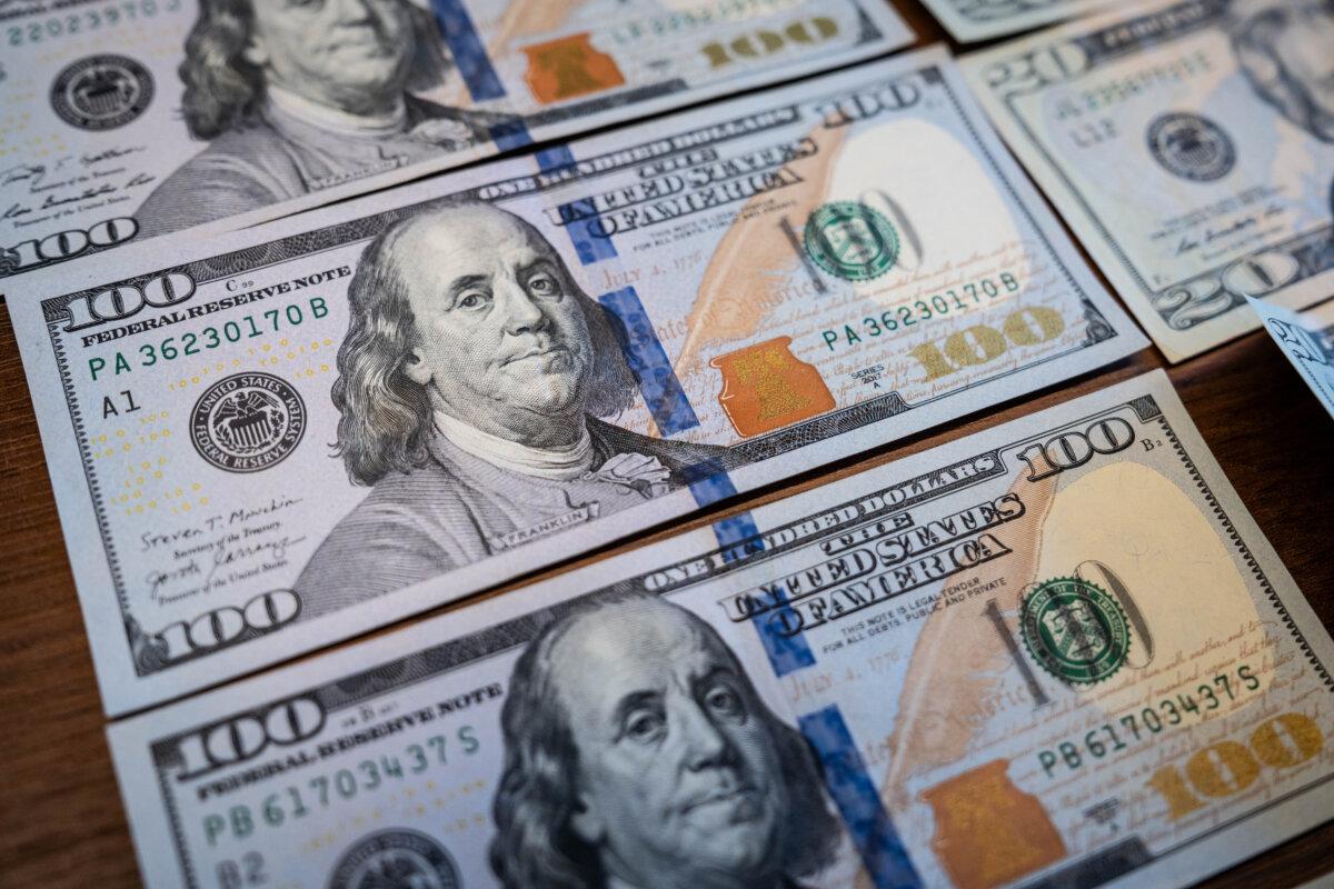 U.S. dollar bills in Washington on Nov. 13, 2025. (Madalina Kilroy/The Epoch Times)