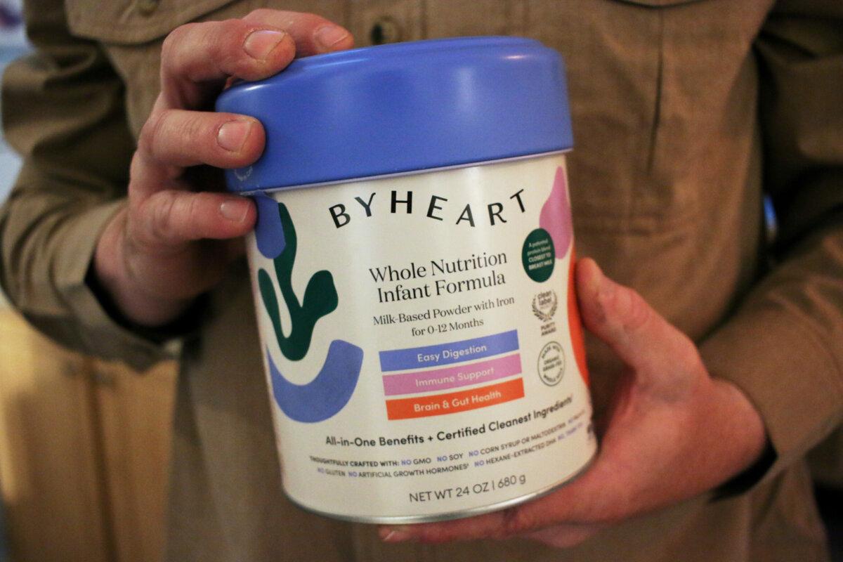 Stephen Dexter holds a container of ByHeart baby formula, which was recently recalled by ByHeart, in Flagstaff, Ariz., on Nov. 12, 2025. (Cheyanne Mumphrey/AP Photo)