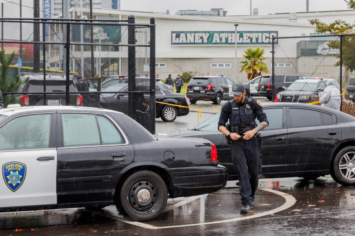 Police work the scene after a shooting at Laney College in Oakland, Calif., on Nov. 13, 2025. (Santiago Mejia/San Francisco Chronicle via AP)