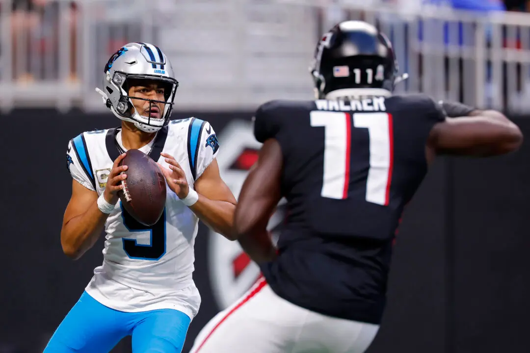 Bryce Young Plays Through Pain on His Way to Historic Performance