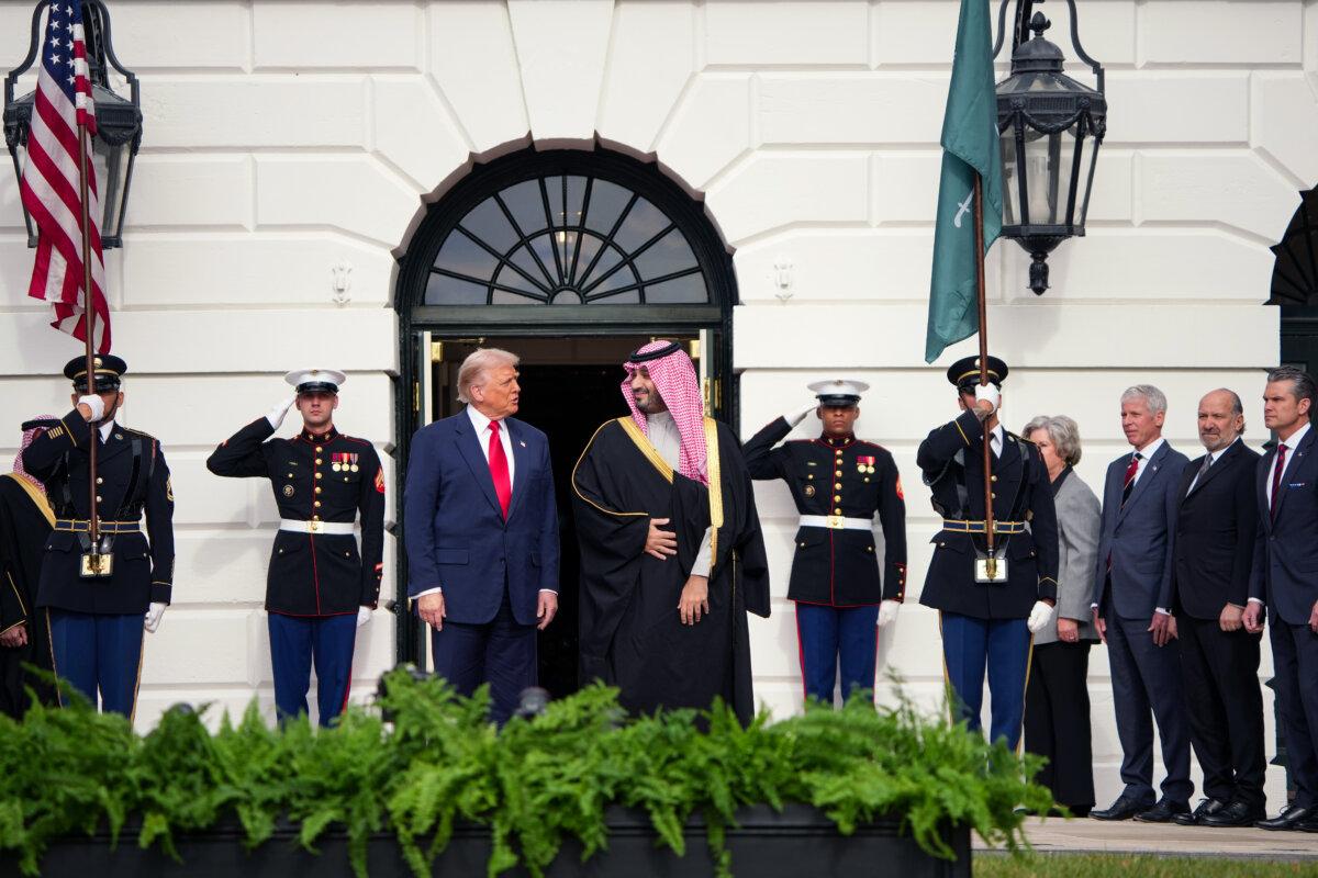 President Donald Trump (C-L) welcomes Crown Prince and Prime Minister Mohammed bin Salman Al Saud of Saudi Arabia (C-R) during an arrival ceremony at the White House on Nov. 18, 2025. (Andrew Harnik/Getty Images)