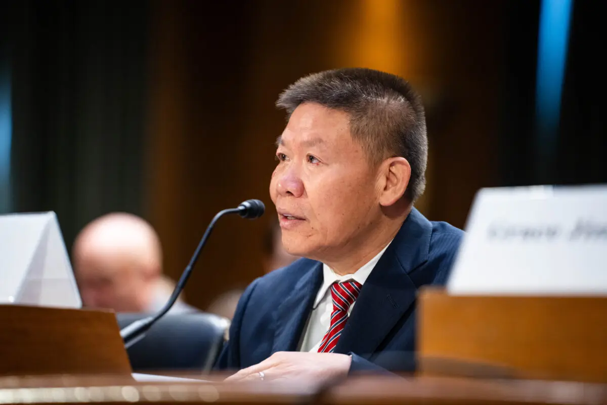 Bob Fu, founder and president of ChinaAid, testifies before the Congressional-Executive Commission on China (CECC) on Capitol Hill in Washington on Nov. 20, 2025. (Madalina Kilroy/The Epoch Times)