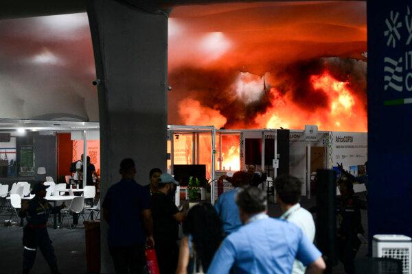 Day in Photos: Fire at the UN Climate Conference, Blackout in Ukraine, and Christmas Market in Germany