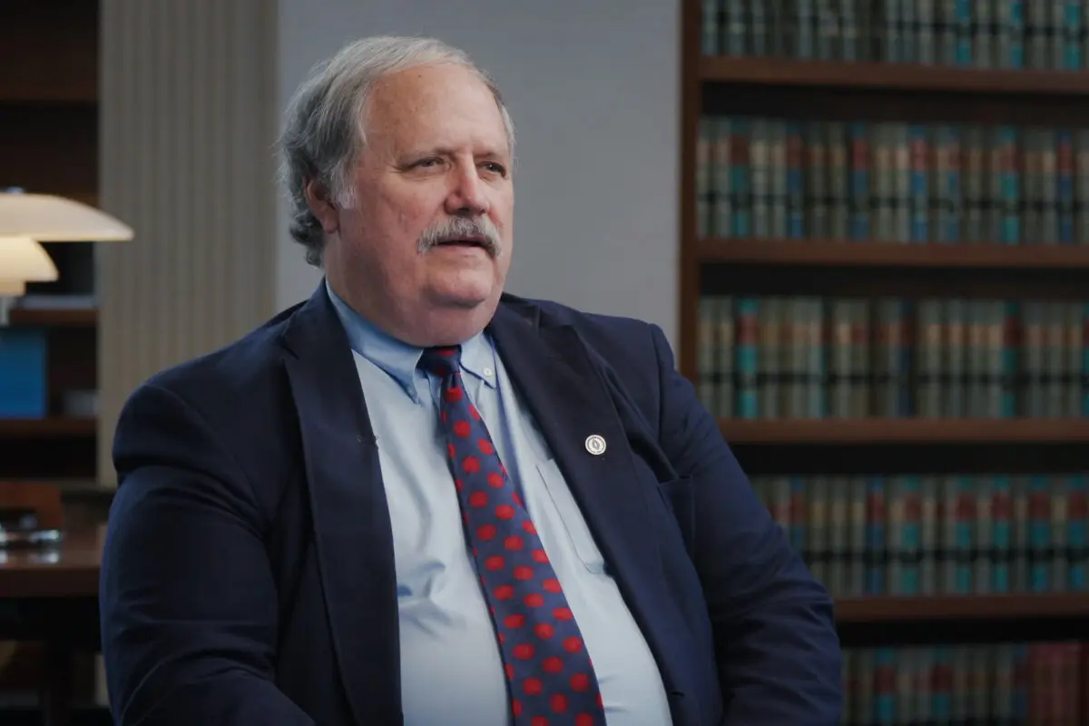 Professor Ronald Rychlak, co-author of "Disinformation," sits for an interview for the Epoch Times documentary “Truth Under Fire: The Framing of Charlie Kirk.” (The Epoch Times)