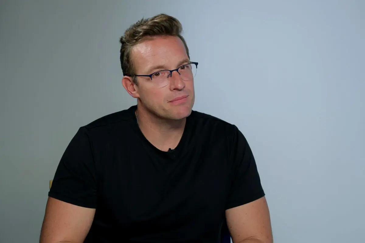 Benny Johnson, former chief creative officer at Turning Point USA, sits for an interview for the Epoch Times documentary “Truth Under Fire: The Framing of Charlie Kirk.” (The Epoch Times)