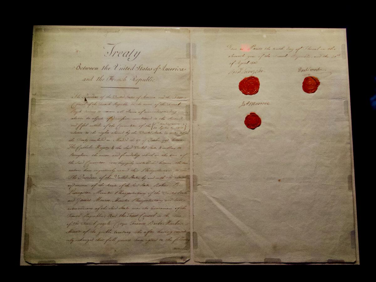 The Louisiana Purchase Treaty is on display at the National Archives in "The American Story" exhibit, as seen during a grand opening preview on Nov. 21, 2025. (Travis Gillmore/The Epoch Times)