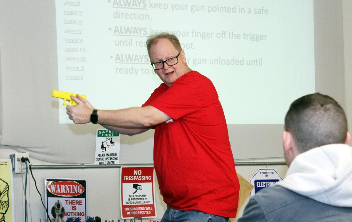 New York firearms instructor Pete Donahoo teaches a class in Peekskill, N.Y., in November 2023. (Michael Clements/The Epoch Times)