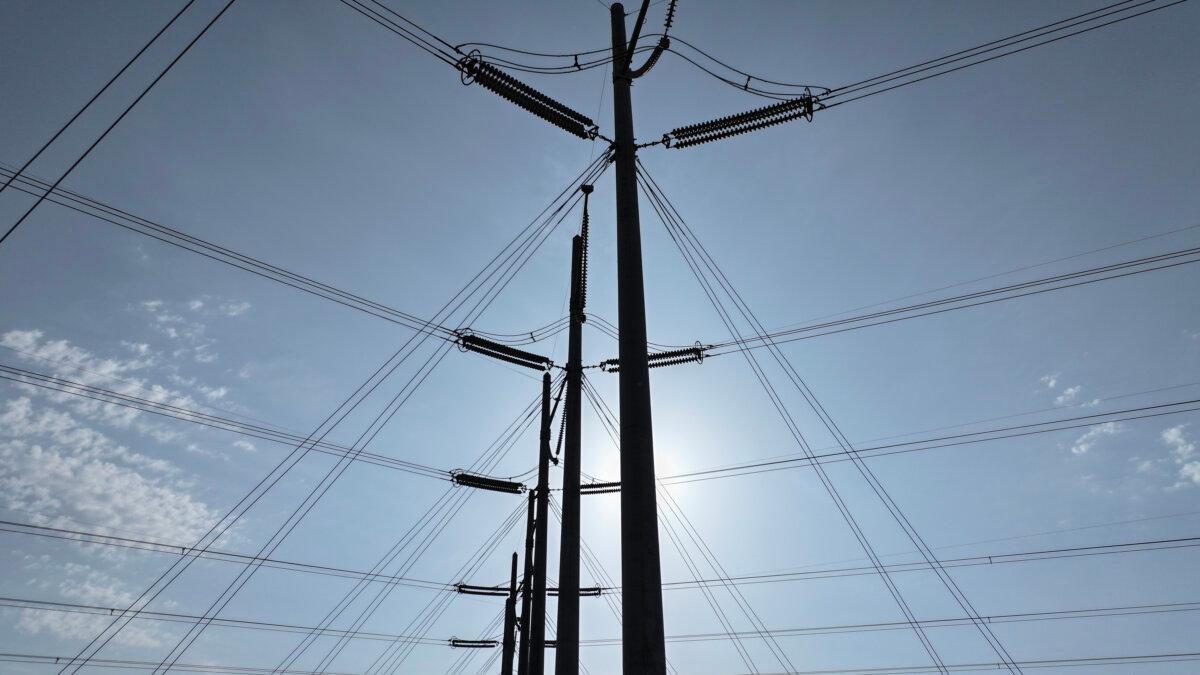 Microsoft Says Americans Won’t Pay Higher Electricity Costs for Its AI Data Centers High voltage power lines run along the electrical power grid in West Palm Beach, Fla., on May 16, 2024. (Joe Raedle/Getty Images)