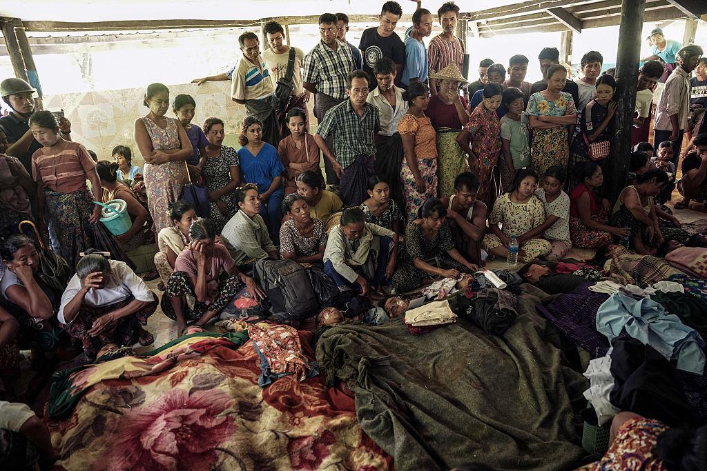 Mourners react during a funeral for the victims of a military bombardment of Mrauk-U, Burma, on Aug. 26, 2025. An air strike on the rebel-held town killed at least 12 people, witnesses said. (AFP via Getty Images)