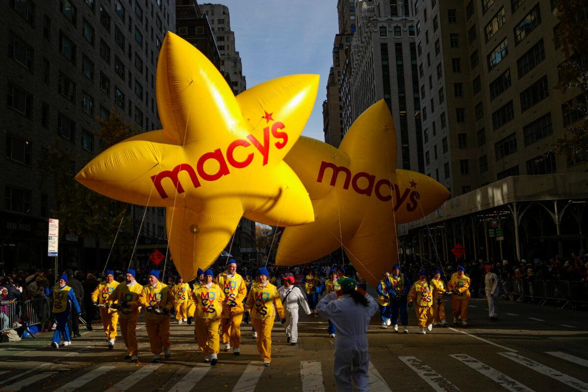 Balloon handlers guide the Macy's balloons down Sixth Avenue during the Macy's Thanksgiving Day Parade in New York City on Nov. 27, 2025. (Eduardo Munoz Alvarez/AP Photo)