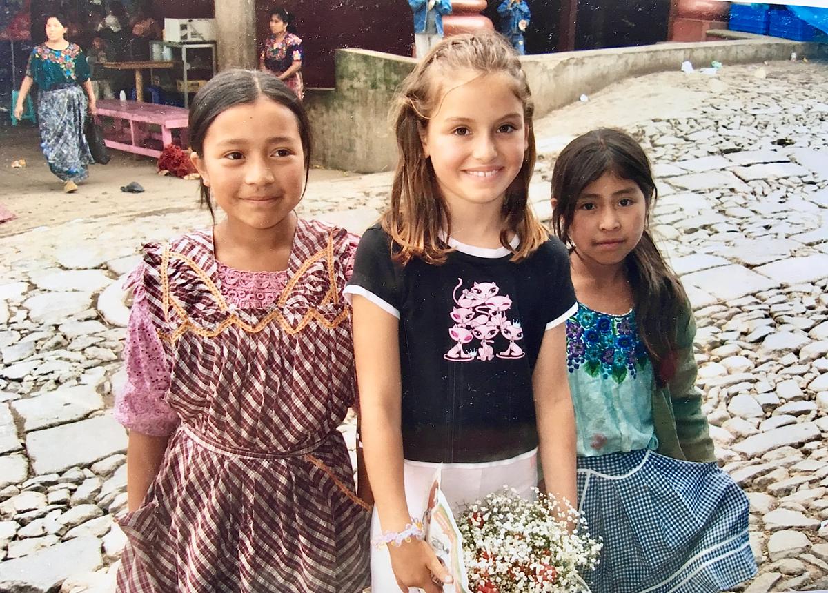 Cassie Ross (C) at an orphanage in Guatemala, 2005. (Courtesy of the Ross family)