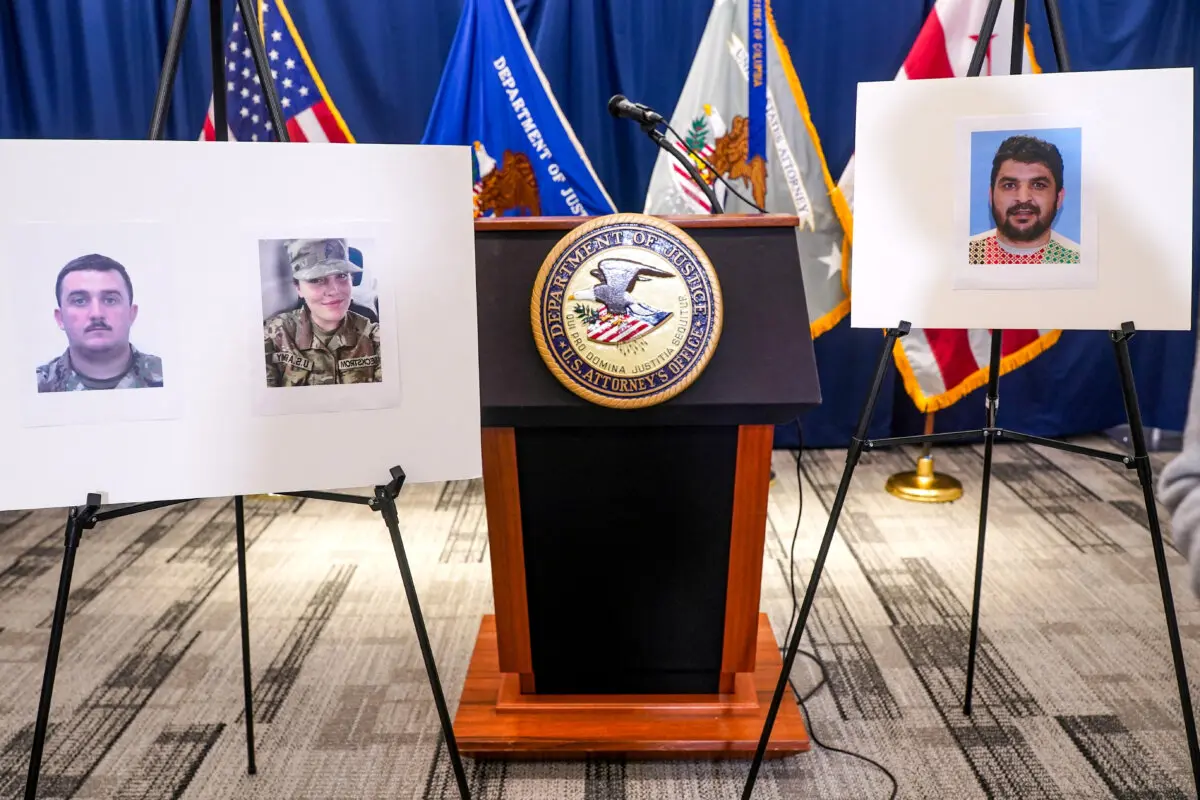 Pictures of National Guard members Andrew Wolfe and Sarah Beckstrom, who were shot on Nov. 26 in Washington, are displayed next to a picture of the suspect of the shooting, Afghan national Rahmanullah Lakanwal, on the day of a press conference with FBI Director Kash Patel, U.S. Attorney Jeanine Pirro, and other authorities, in Washington on Nov. 27, 2025. (Nathan Howard/Reuters)