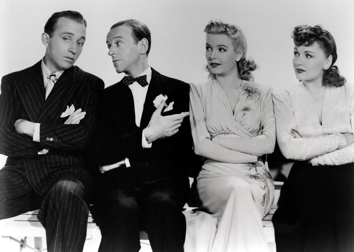 Cast of the 1942 film "Holiday Inn": (L–R) Bing Crosby as Jim, Fred Astaire as Ted, Marjorie Reynolds as Linda, and Virginia Dale as Lila. (Paramount Pictures)