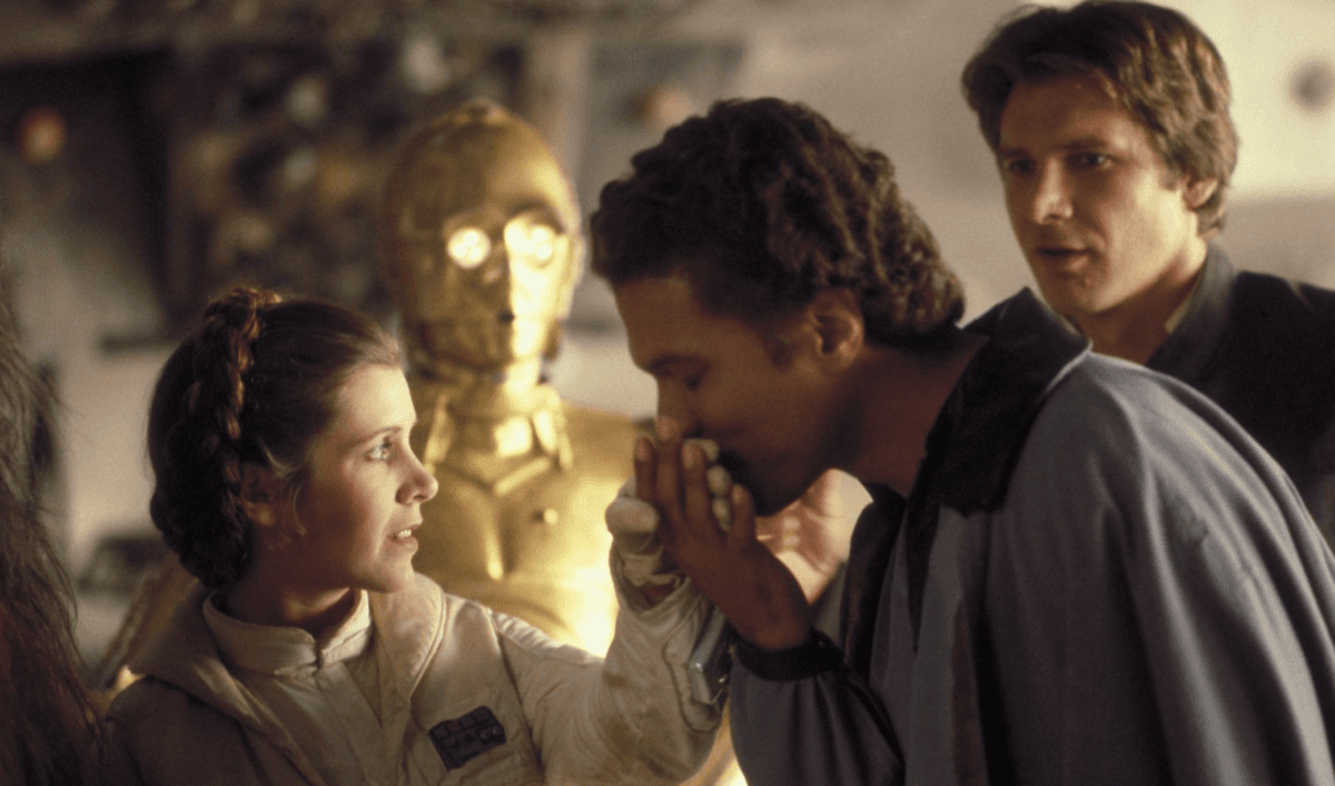 Lando Calrissian (Billy Dee Williams) kisses Leia's (Carrie Fisher) hand, in "Star Wars: Return of the Jedi." (20th Century Fox)