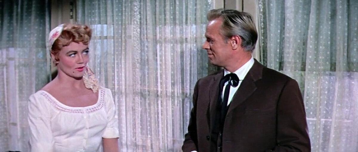 Lily Dollar (Dorothy Malone) meets Johnny Gannon (Richard Widmark), who's all cleaned up, in “Warlock.” (20th Century Fox)