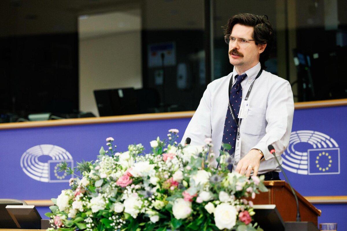 Matthew Robertson, a China studies research fellow at the Victims of Communism Memorial Foundation, speaks at the fifth annual summit of the Inter-Parliamentary Alliance on China in Brussels on Nov. 7, 2025. (Courtesy of Inter-Parliamentary Alliance on China)