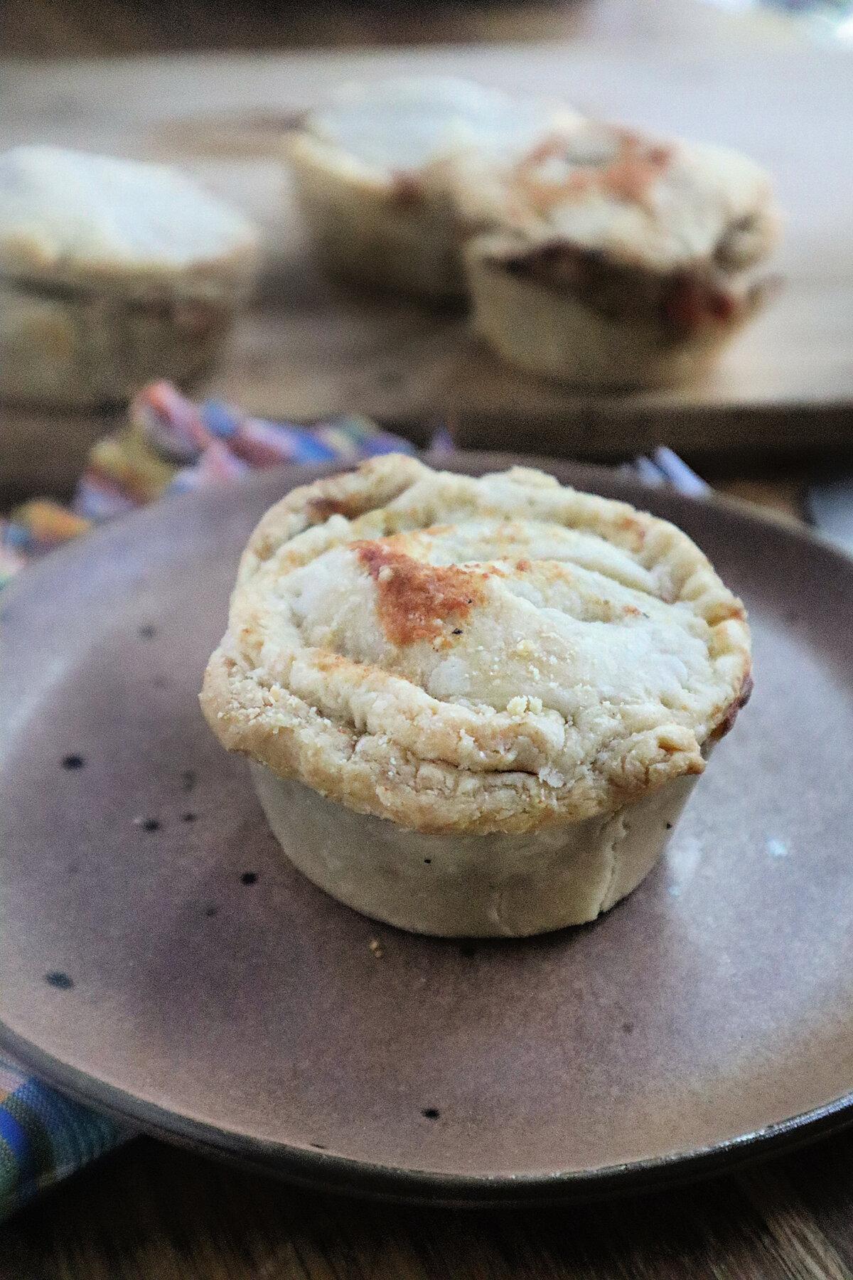 Mini chicken pot pies made in a muffin tin can be frozen and reheated when the urge for comfort food hits. (Gretchen McKay/Pittsburgh Post-Gazette/TNS)