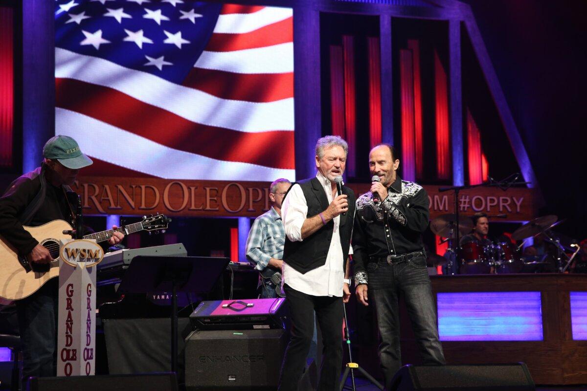Singer Larry Gatlin (L) and Greenwood perform at the Grand Ole Opry House in Nashville, Tenn., on June 27, 2014. (Terry Wyatt/Stringer/ Getty Images)
