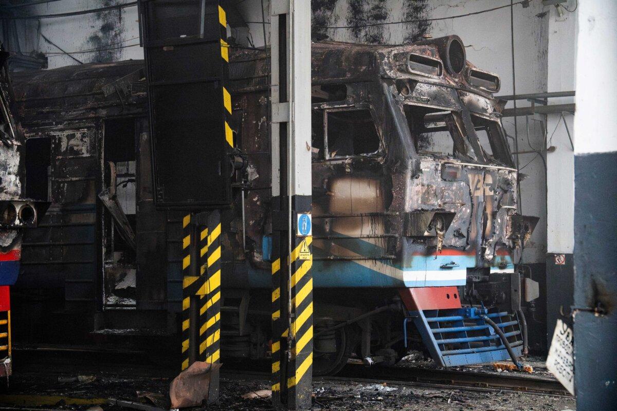 Charred electric trains are seen in a damaged depot in the town of Fastiv, Kyiv region, after an air attack, on Dec. 6, 2025, amid the Russian invasion of Ukraine. (Serhii Okunev/AFP via Getty Images)