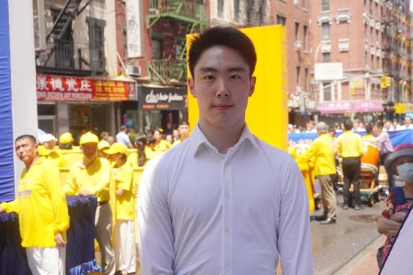 Louis Liu joined Falun Gong practitioners in New York City on July 20, 2025, in a parade calling for an end to the Chinese Communist Party's 26-year persecution of Falun Gong. (Mark Zou/The Epoch Times)