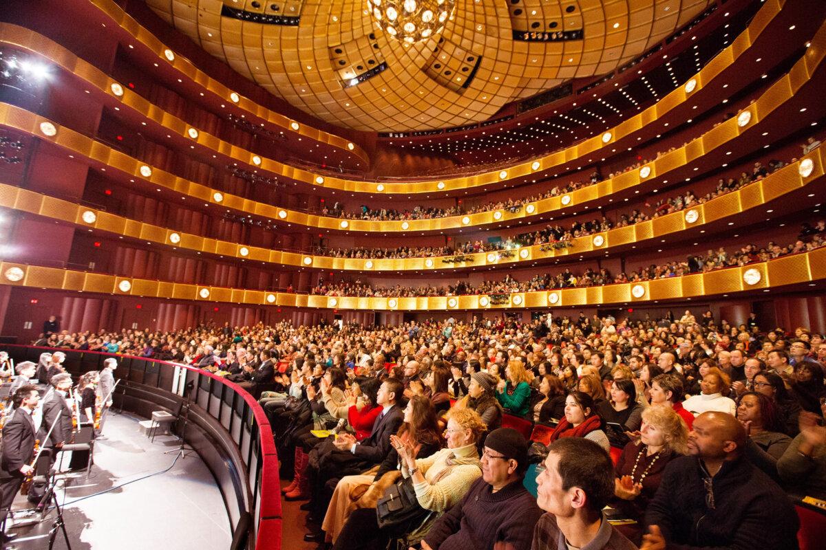 Audience members watch a performance of Shen Yun Performing Arts at the Lincoln Center in New York on Jan. 14, 2016. (Larry Dye/The Epoch Times)