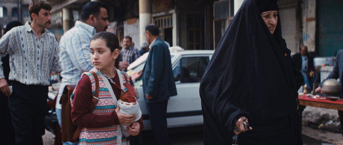 Lamia (Baneen Ahmad Nayyef) and Bibi (Waheed Thabet Khreibat) in the big city, in "The President’s Cake." (Sony Pictures Classics)