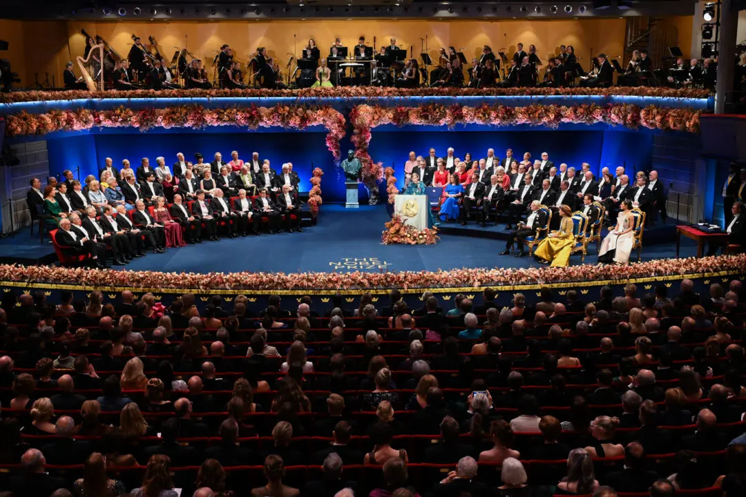 Day in Photos: Nobel Prize Award Ceremony, 2 Buildings Collapse in Morocco, Flooding in England