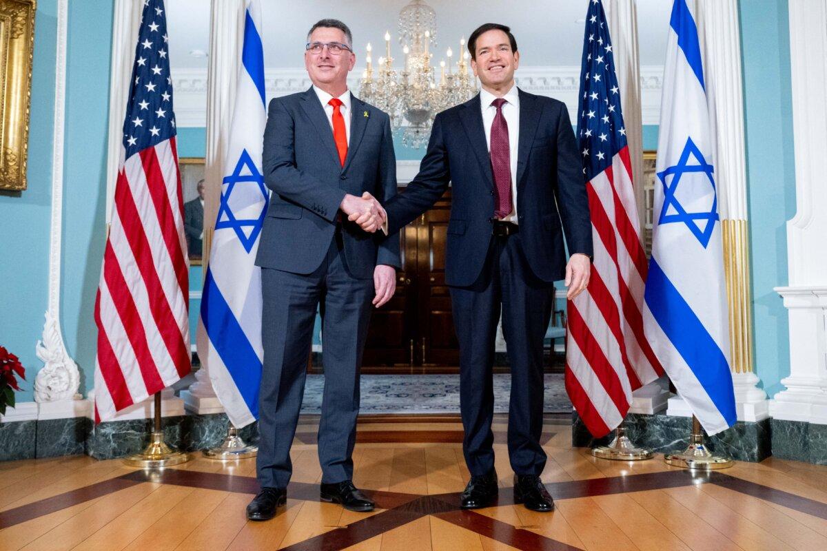 U.S. Secretary of State Marco Rubio and Israeli Foreign Minister Gideon Sa'ar (L) shake hands before meetings at the State Department in Washington on Dec. 10, 2025. (Saul Loeb/AFP via Getty Images)