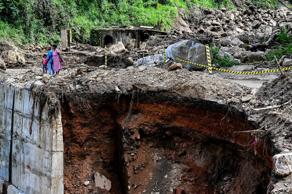 Day in Photos: Eruption of Mount Semeru, Winter Fiesta, and Scuba-Diving Santa Claus thumbnail