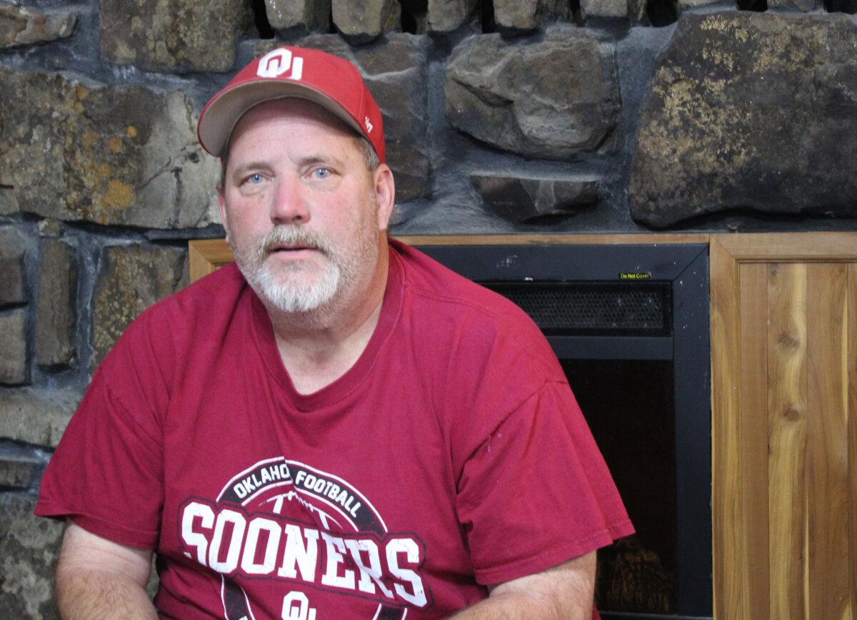 Russell Fincher in his home in Tuskahoma, Okla., on Nov. 20, 2025. (Michael Clements/The Epoch Times)