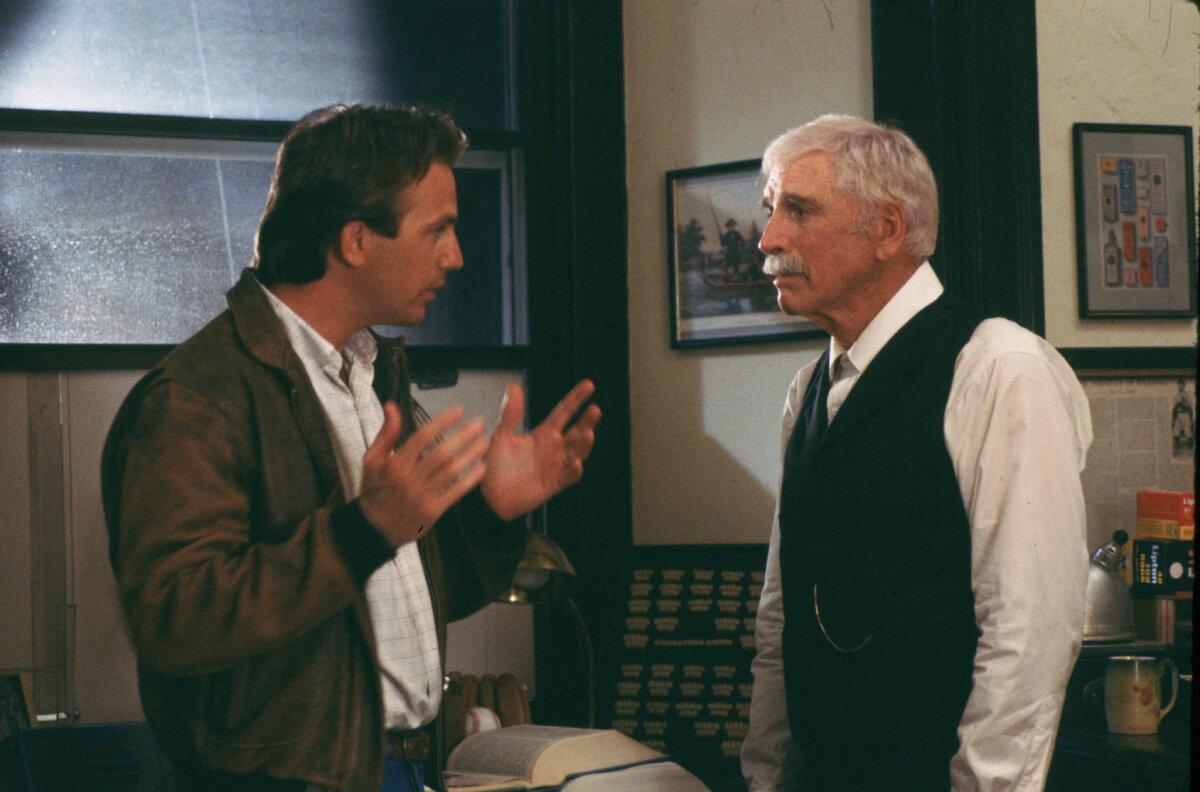Ray Kinsella (Kevin Costner, L) and Dr. Archibald “Moonlight” Graham (Burt Lancaster), in “Field of Dreams.” (Caralco Pictures/MovieStillsDB)