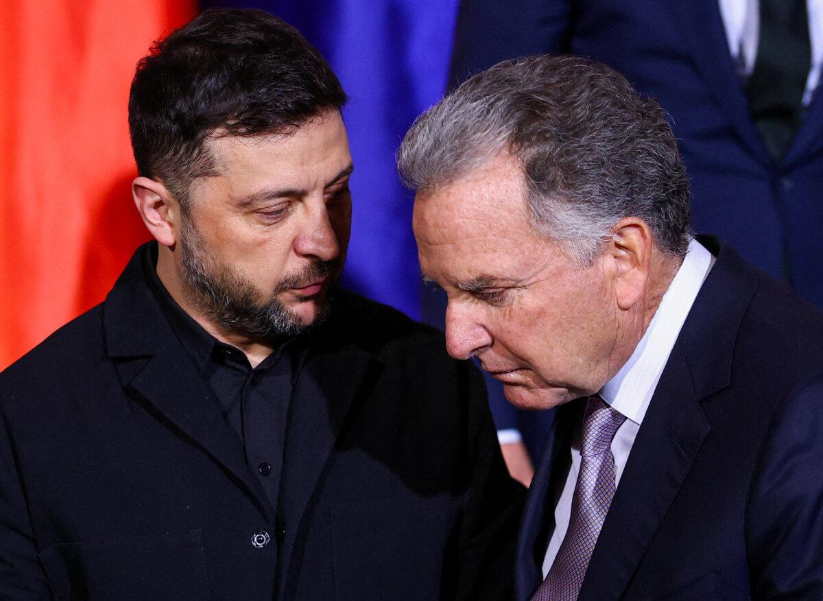 Ukrainian President Volodymyr Zelenskyy (L) and U.S. special envoy Steve Witkoff (R) talk as they pose for a photo at the Chancellery in Berlin on Dec. 15, 2025. (Lisi Niesner/AFP via Getty Images)