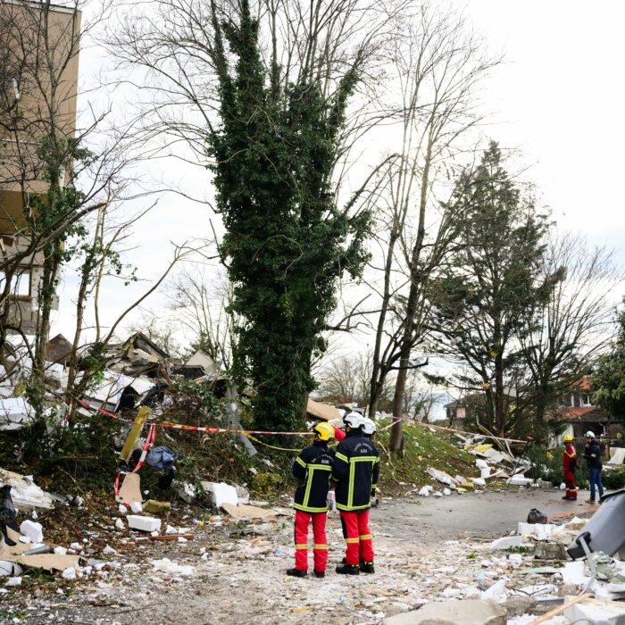 Day in Photos: Explosion in France, Flood Cleanup in Indonesia, and Harvesting Brussels Sprouts